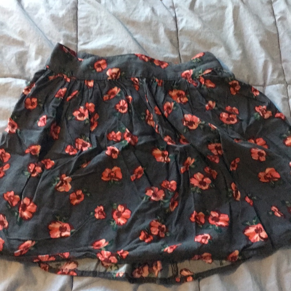 3/$10.   Hollister floral miniskirt